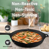 Black cast iron skillet with food on a wooden table, featuring text about properties.