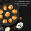 Cast iron cookware with food items on a black background