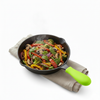 Frying pan with colorful vegetables on a white background
