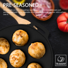 Pre-seasoned cast iron pan with baked goods on a dark surface with text about seasoning method.
