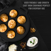 Cast iron skillet with baked items on a black background