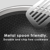 Metallic spatula on a black cookware surface with text highlighting its properties.