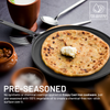 Pre-seasoned cast iron skillet with a flatbread and butter on a dark surface with utensils.