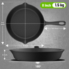 Black frying pan with measurements on a gray background