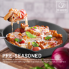 Pre-seasoned cast iron skillet with pasta dish, featuring Esspy brand logo.