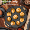 Black round baking pan with food on a wooden surface, highlighting dual handle design.