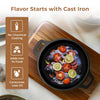Cast iron skillet with vegetables on a wooden cutting board, featuring text about the benefits of cast iron cookware.
