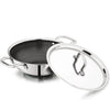 Stainless steel wok with a glass lid on a white background