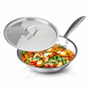 Stainless steel wok with lid containing stir-fry vegetables and meat on a white background